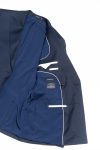 Veste slim croisée Col cran aigu large  Deux poches à rabat droit avec passepoil   Bas de manches quatre boutons   Deux fentes dos   Intérieur entièrement doublé  Pantalon slim